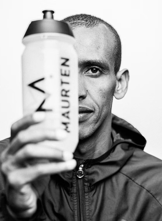 500 ml Maurten sports bottle with a clear plastic body and screw-on lid for hydration during workouts