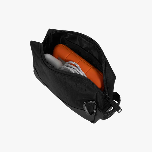 Scicon electronics travel organizer pouch with multiple compartments for cables, chargers, and small gadgets, black fabric.
